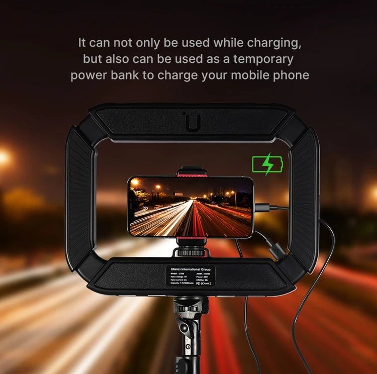 Portable dimmable photography ring light used as a temporary power bank to charge a mobile phone, highlighting its dual functionality during night shoots, available at Aprasi.